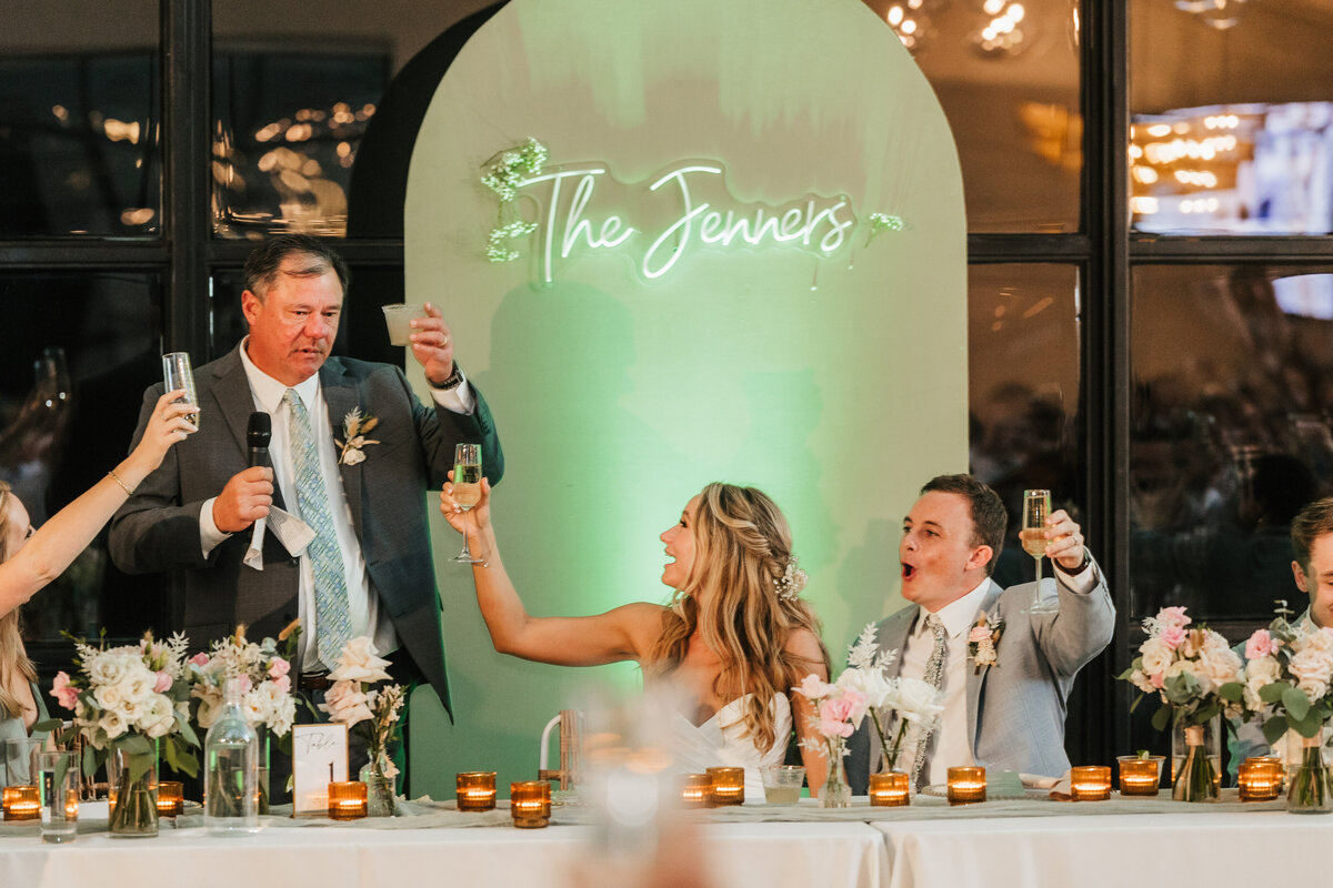 bride and groom toast at maes ridge