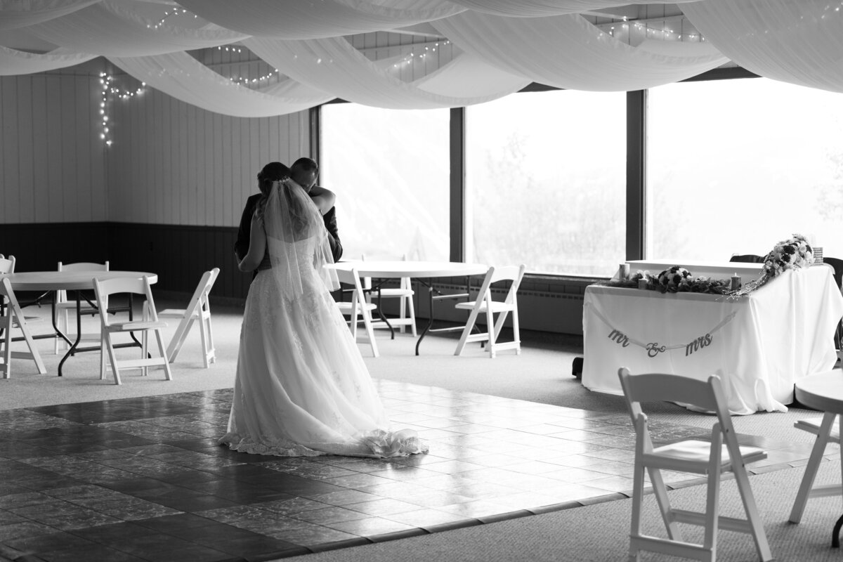 A couple dances after all guests have left