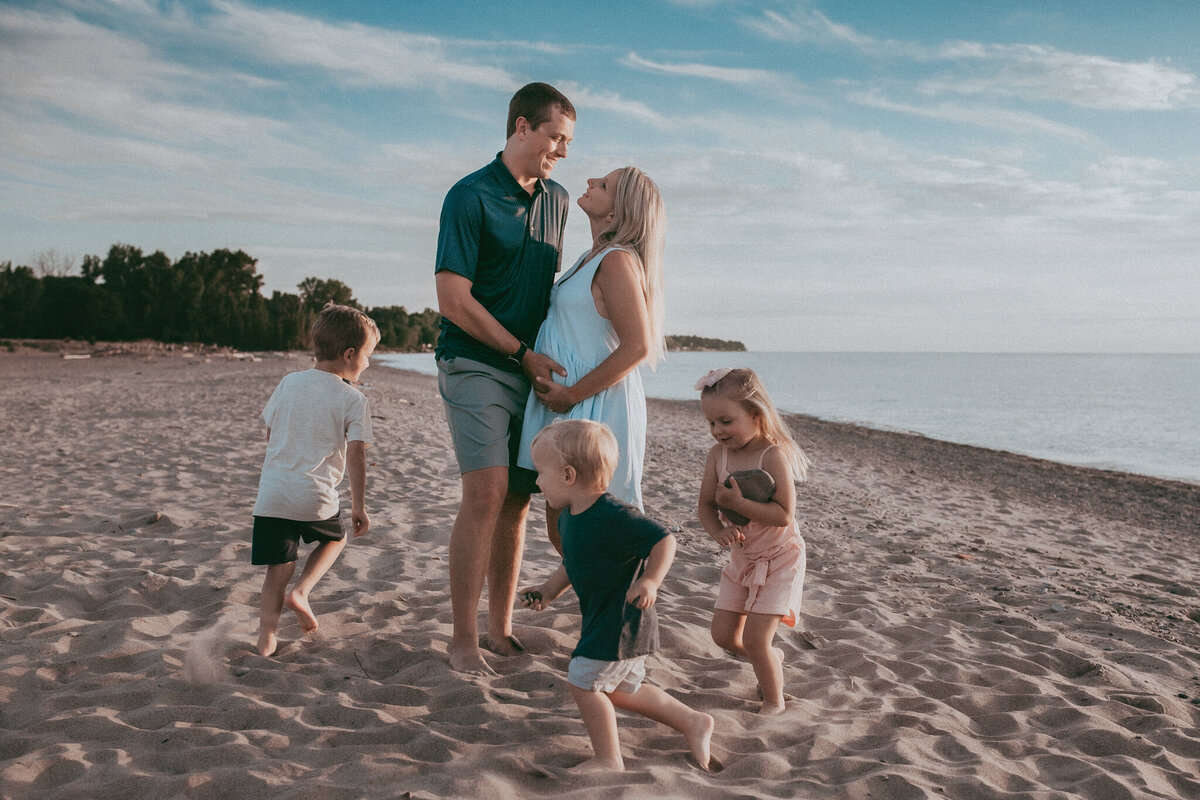 fun family photo with kids running around