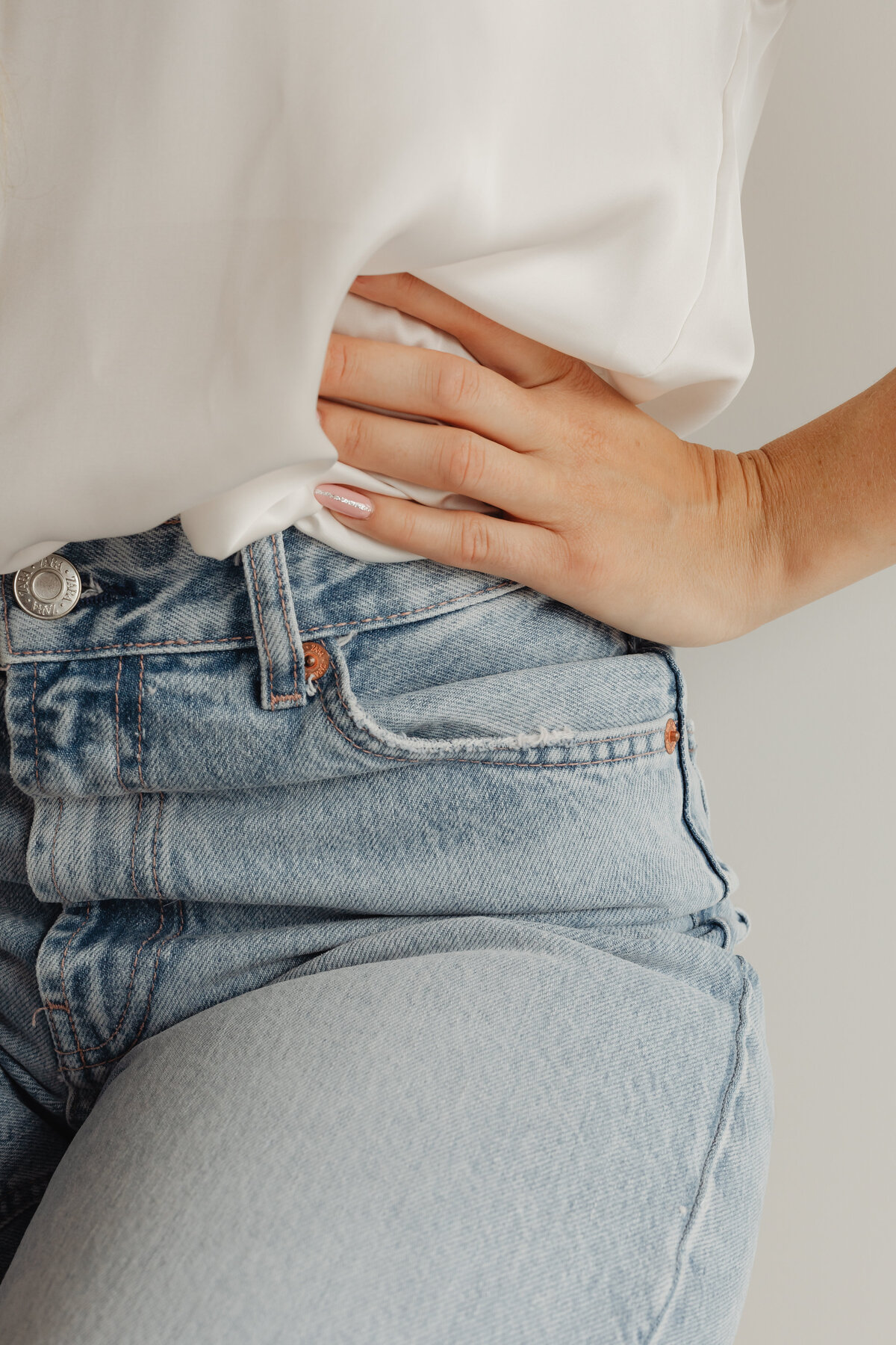kaboompics_light-blue-jeans-white-silk-shirt-27718