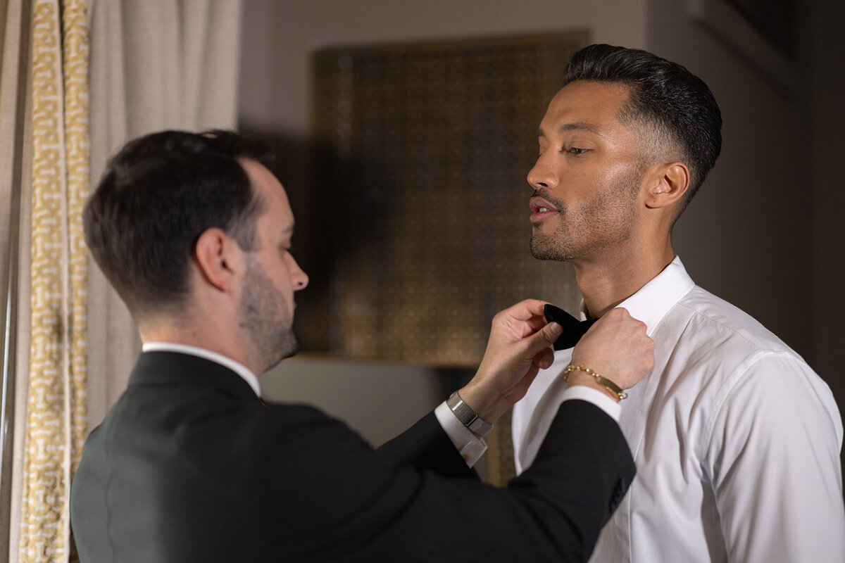 groom getting ready bow tie soho nyc