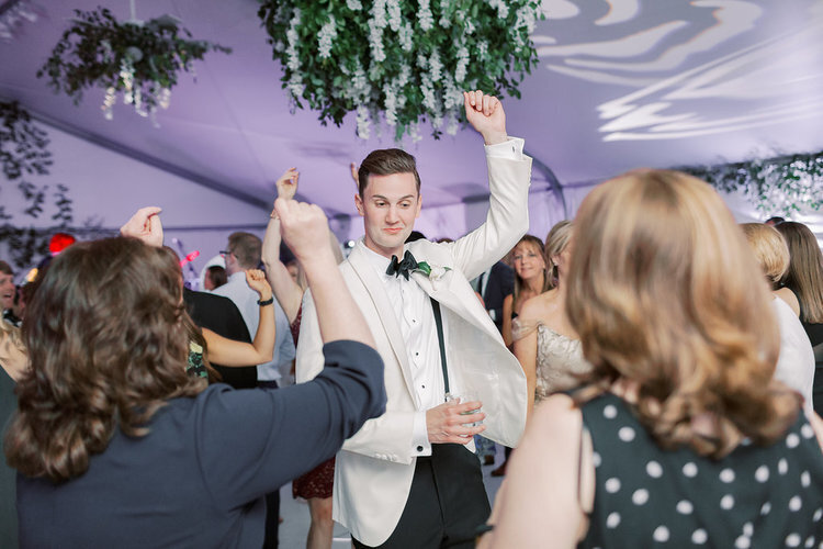 Groom dancing at a Colorado wedding