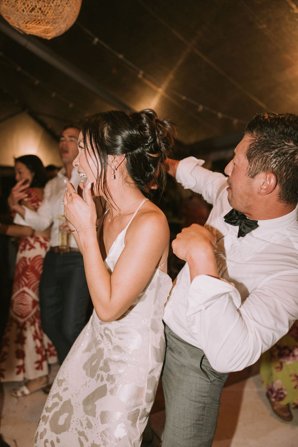 bride and groom dancing at wedding reception ko'olina hawaii