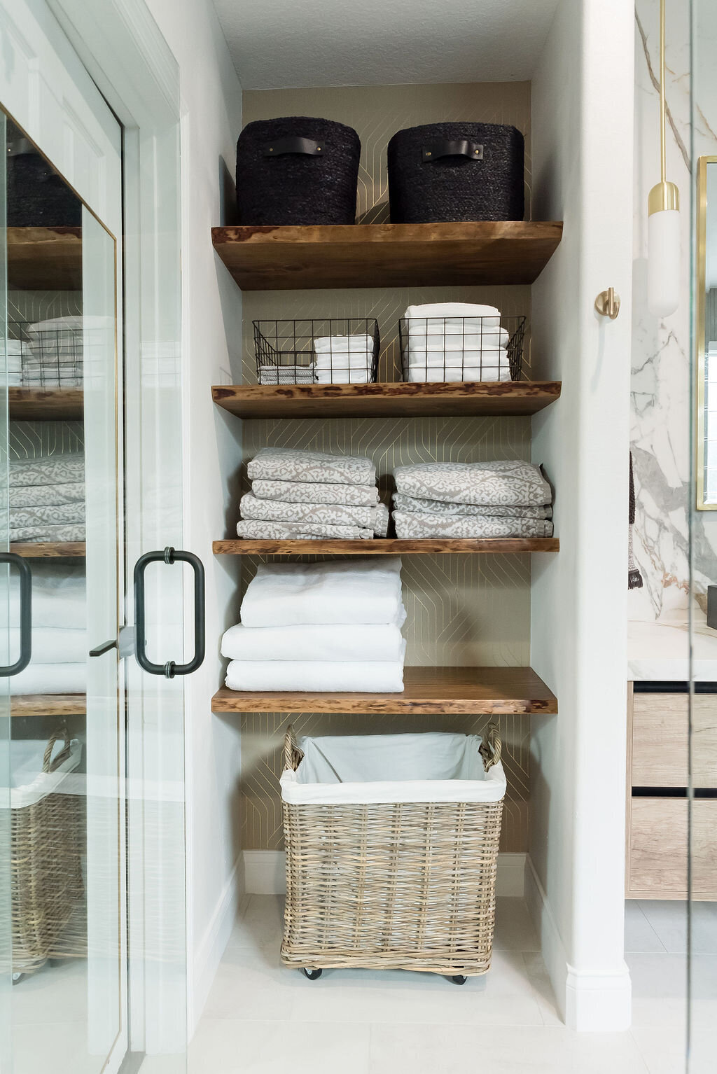 dewine design interiors hotel lux wooden bathroom shelves with towels