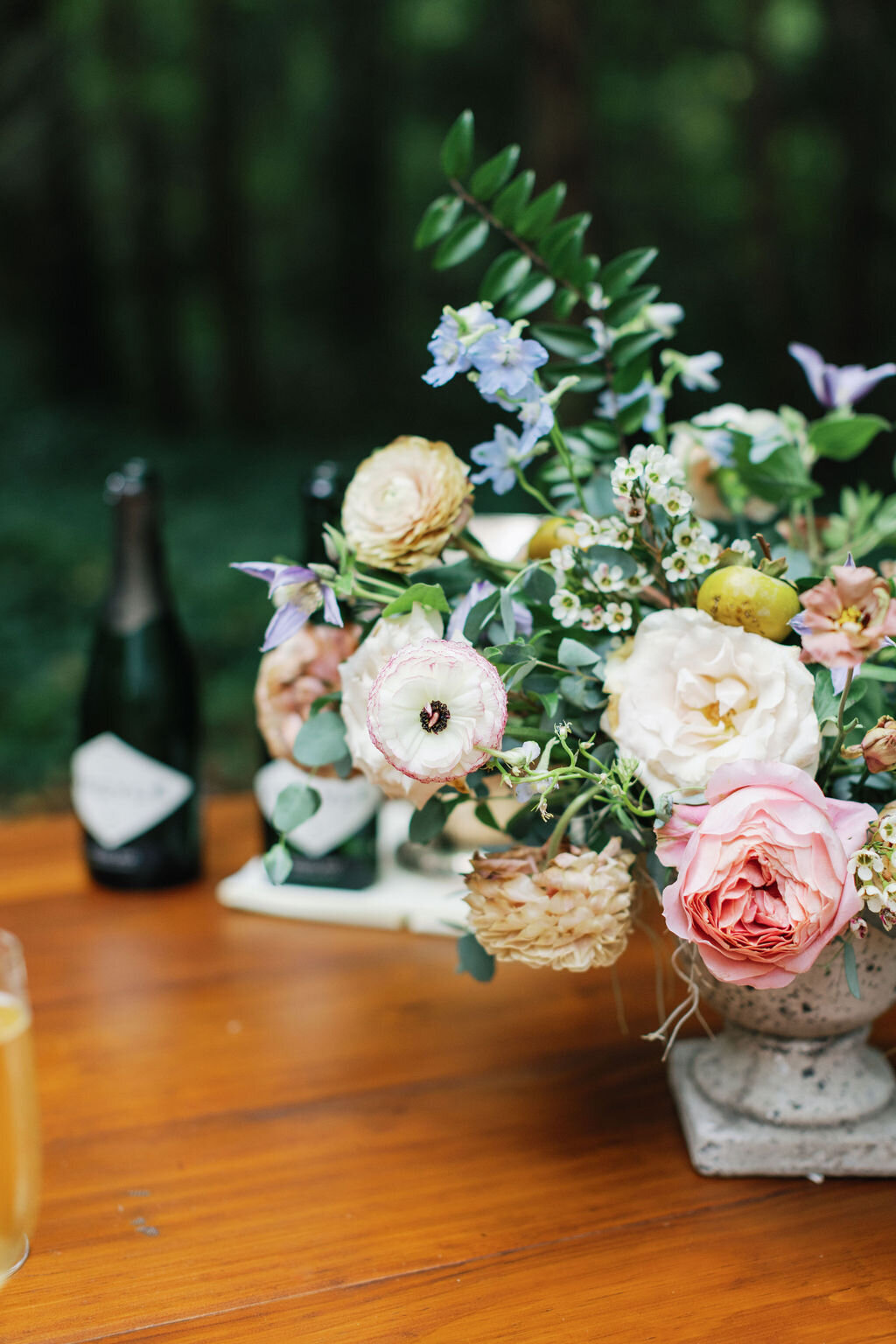 Romantic autumn floral centerpiece with candles, garden roses and lush natural greenery. Wedding floral design at RT Lodge by Rosemary and Finch in Nashville, TN.