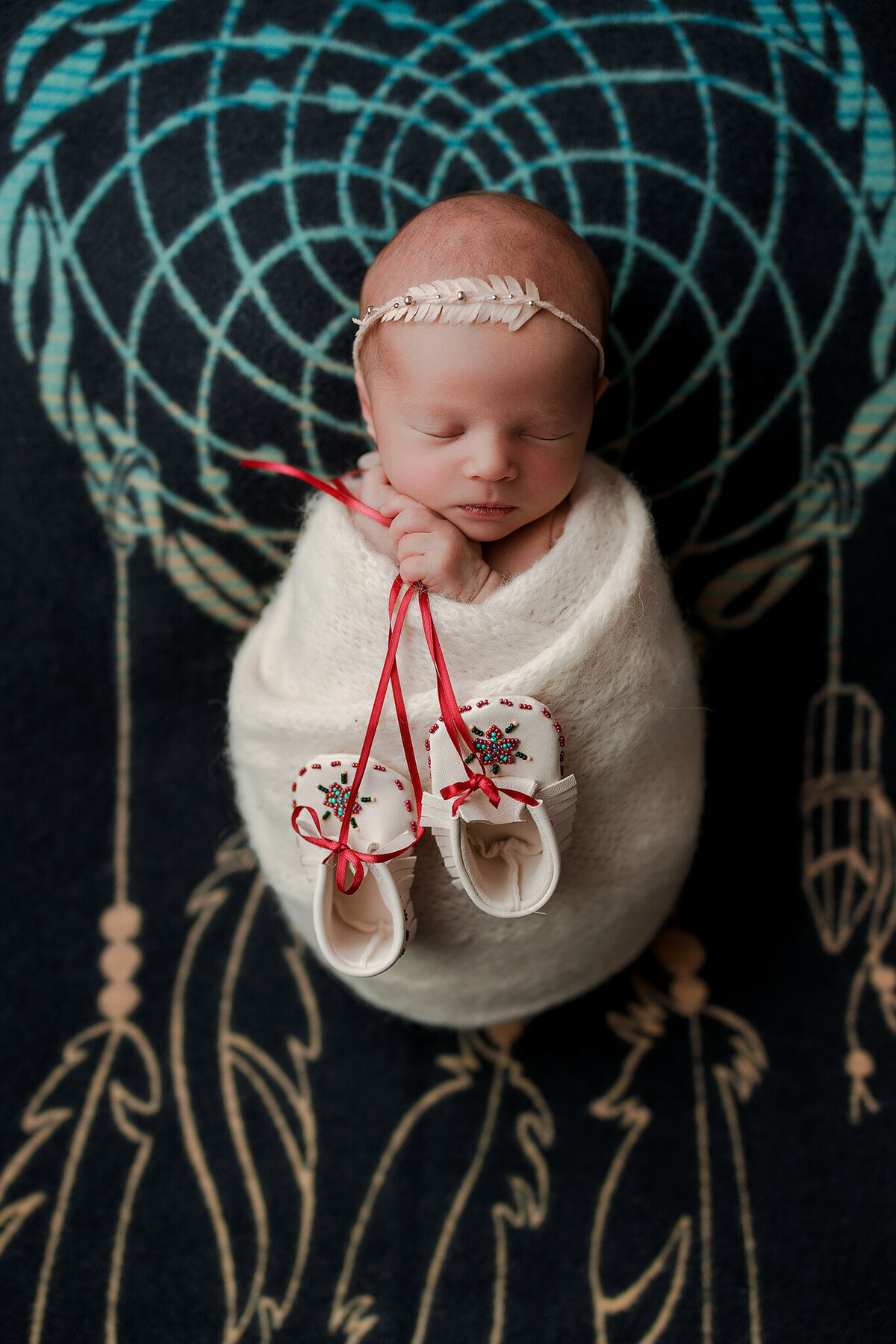 newborn girl in whitefish photography studio
