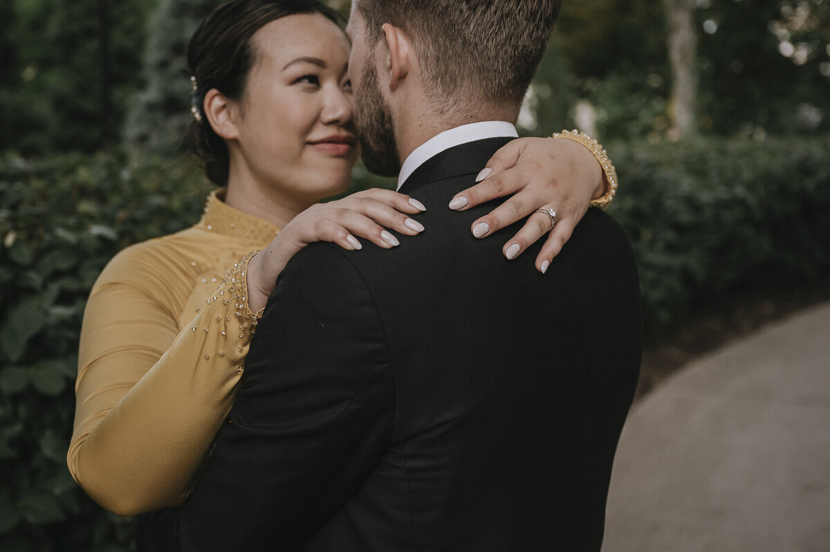 bride and groom embracing