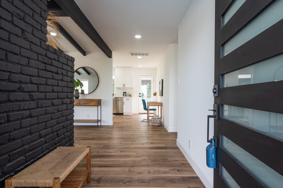 modern-entryway-black-brick-wall-white-oak-flooring-aw-development