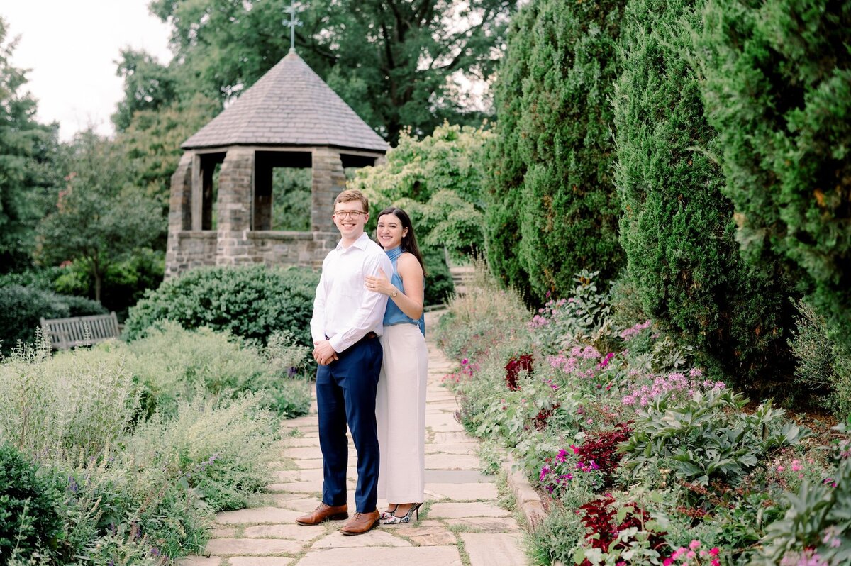 couple standing in a garden