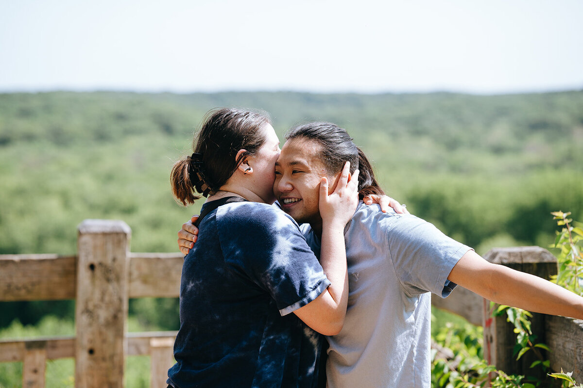 engaged couple embracing after proposal