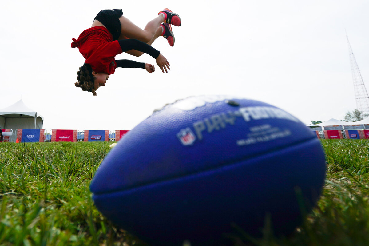 kansas-city-marketing-photography-people-0108-man-flipping-over-giant-football