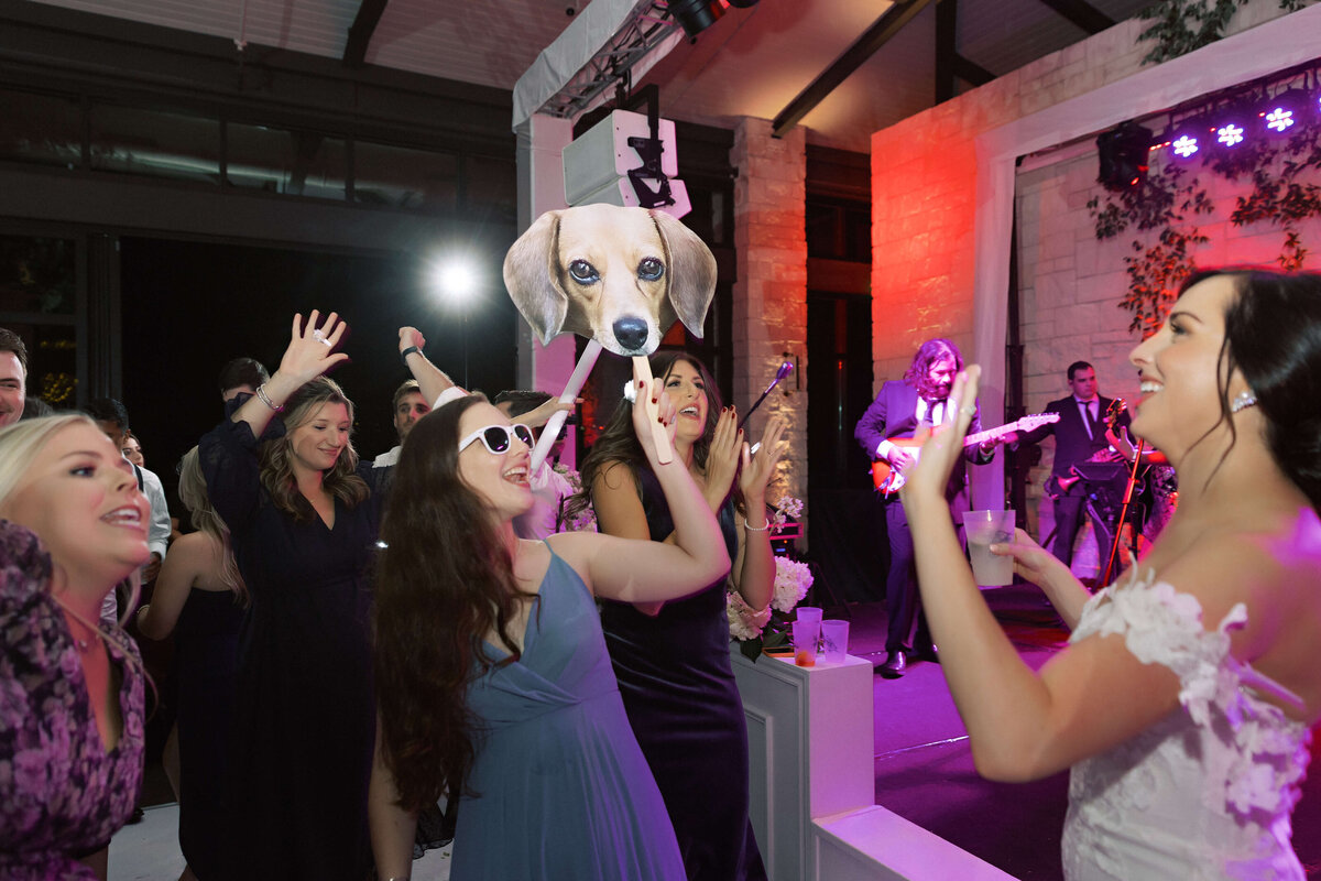 fun wedding reception with dog cutout