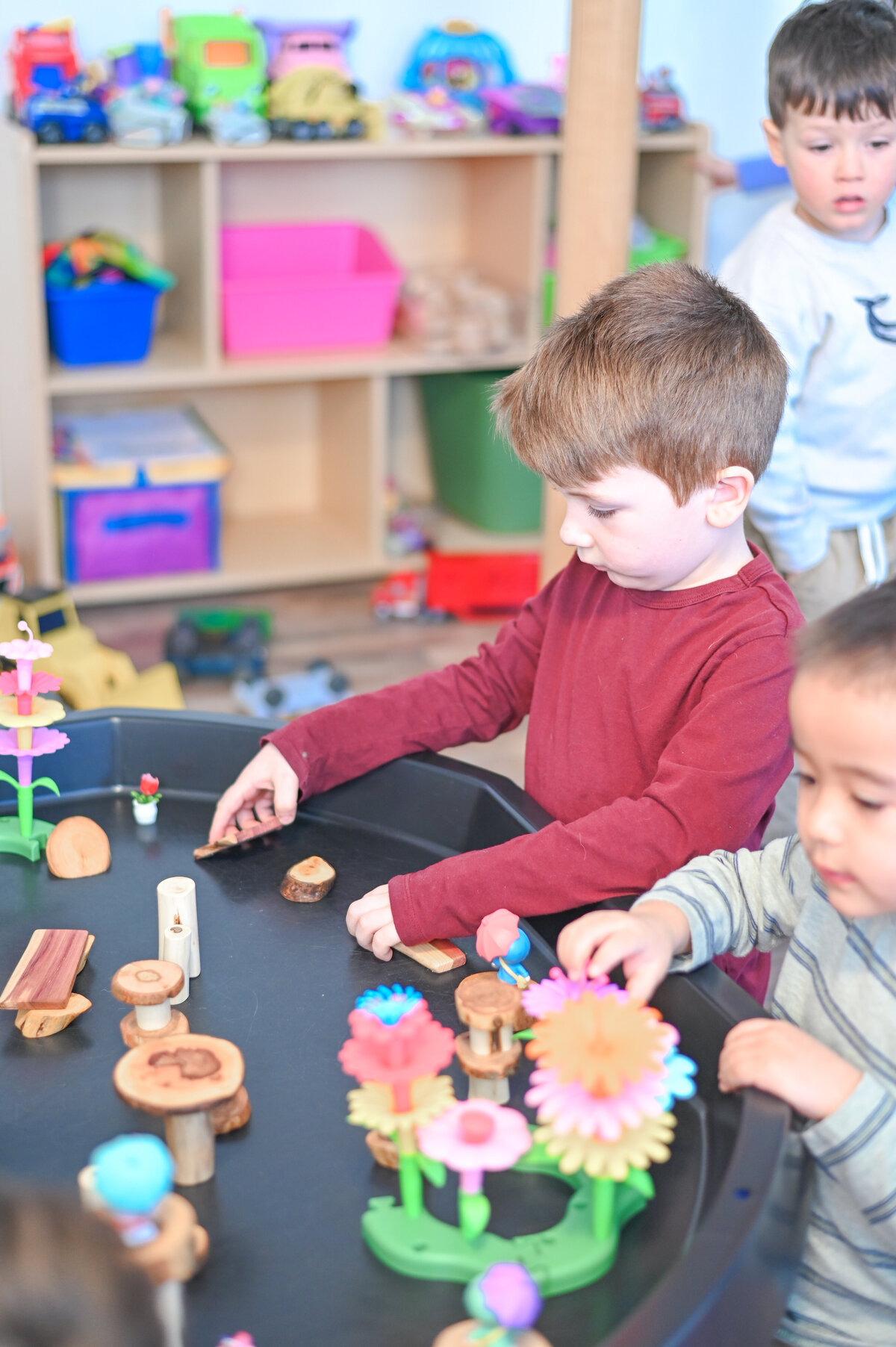 Students playing House of Parker Preschool Gorham Maine where we believe that play isn’t just something children do—it’s how they learn. Through play, children discover the world around them, express their creativity, build relationships, and develop the foundational skills they’ll carry with them for life.