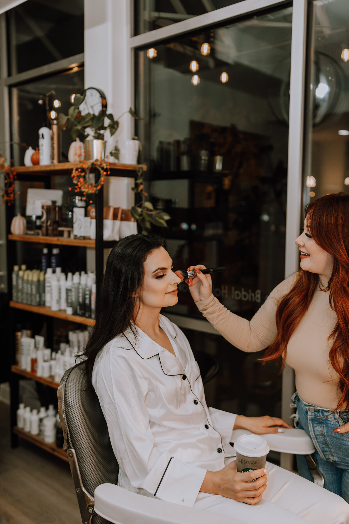 bride getting ready at ember salon