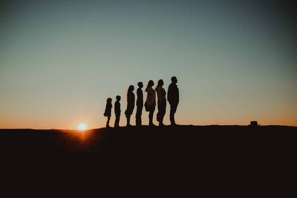 profile photo of family with the sunset rising