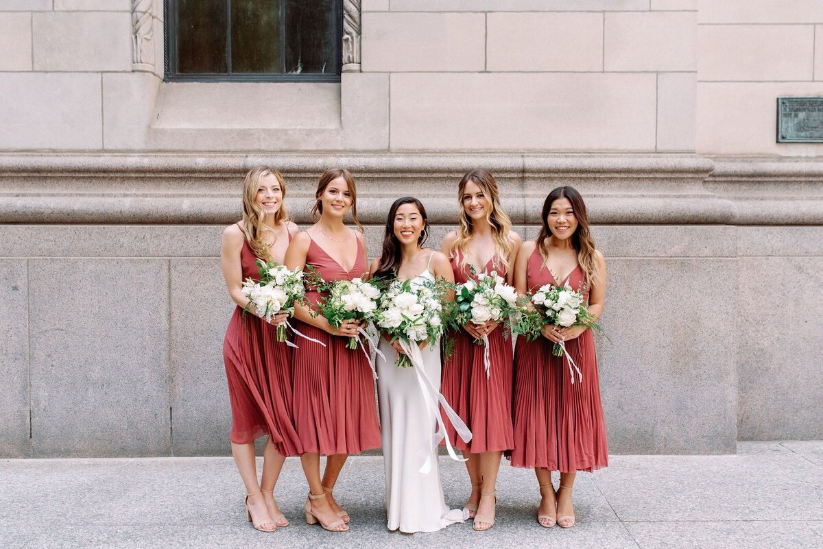 Modern Bride with bridesmaids crimson red dresses by Aritzia editorial wedding at hotel ocho toronto jacqueline james photography