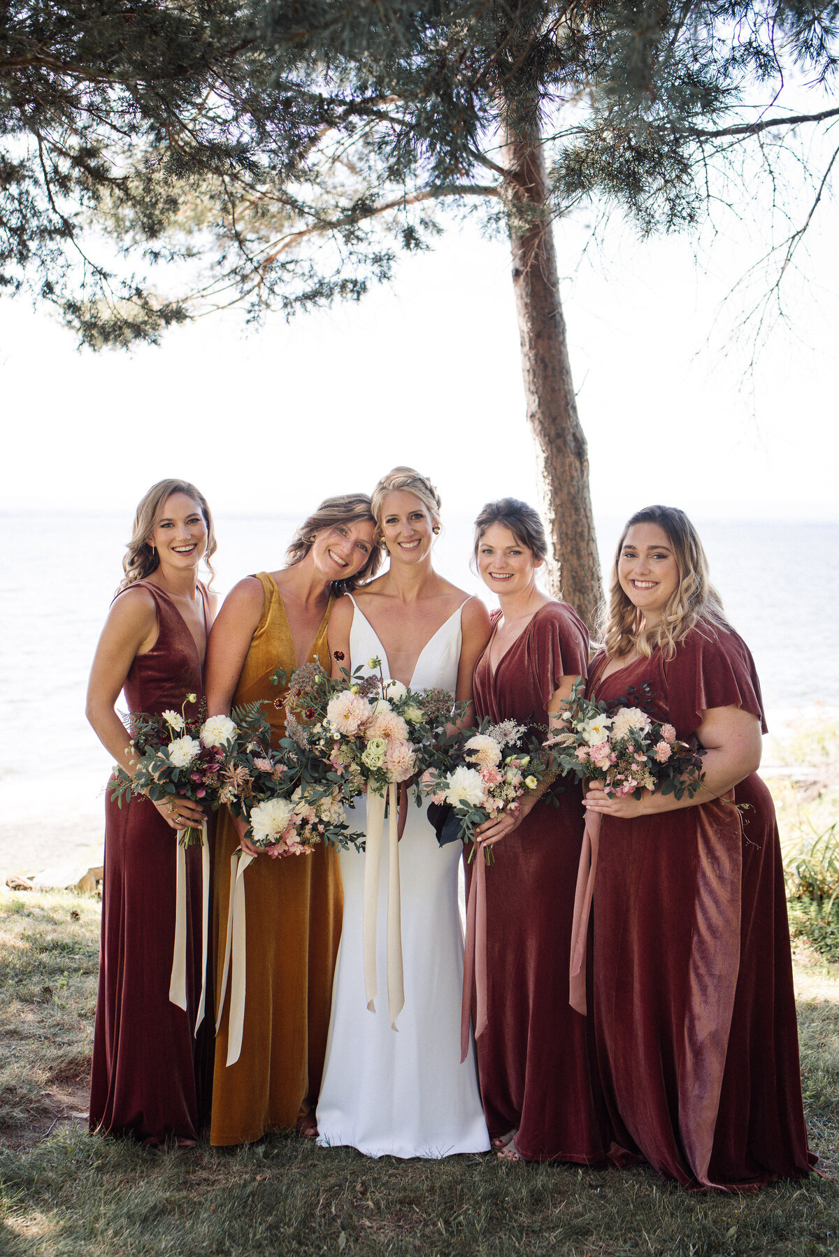 New england Fall wedding bridesmaids  dresses by Jenny yoo. Mismatched and in velvet.