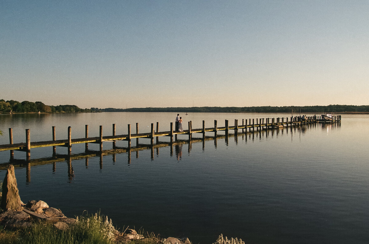 35mm film scan of bride and groom at sunset