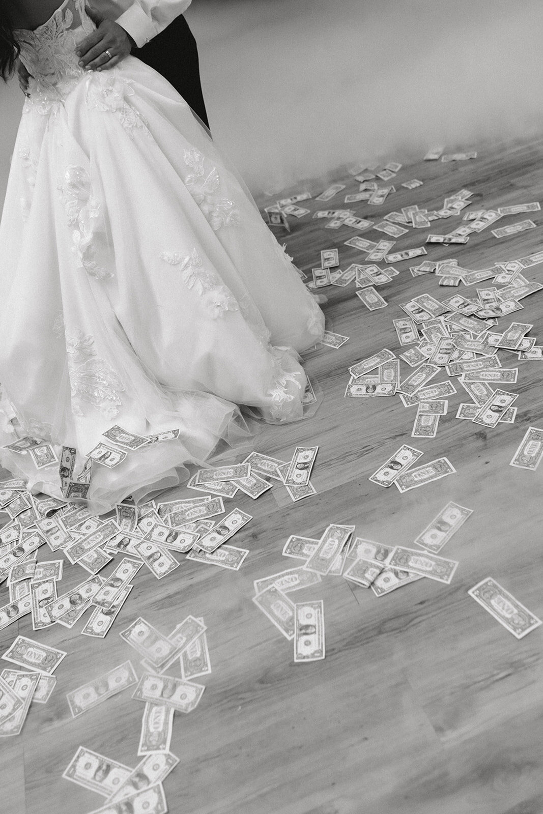 Money scattered on the floor of an Arabic wedding reception.