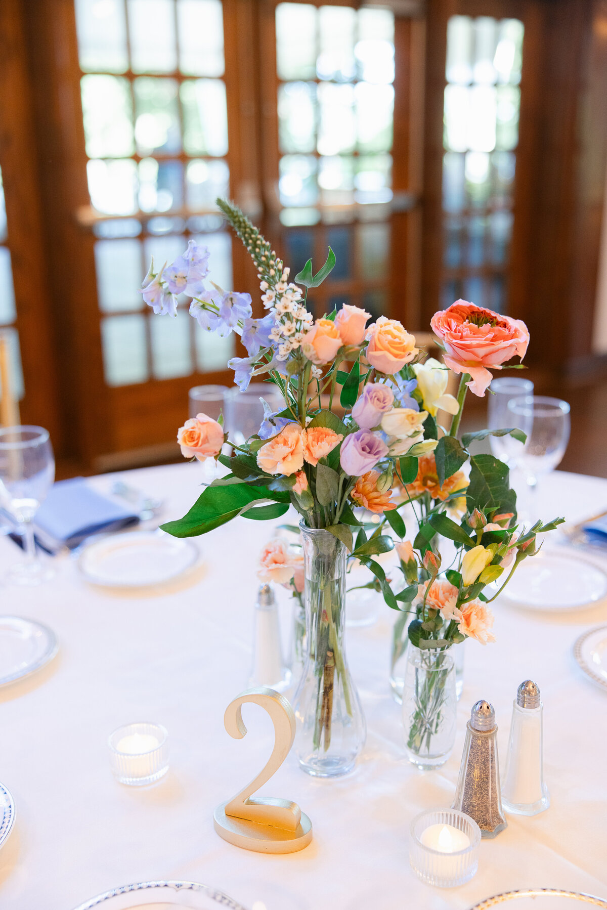 bright-floral-bud-vases-centerpieces-saint-clements-castle