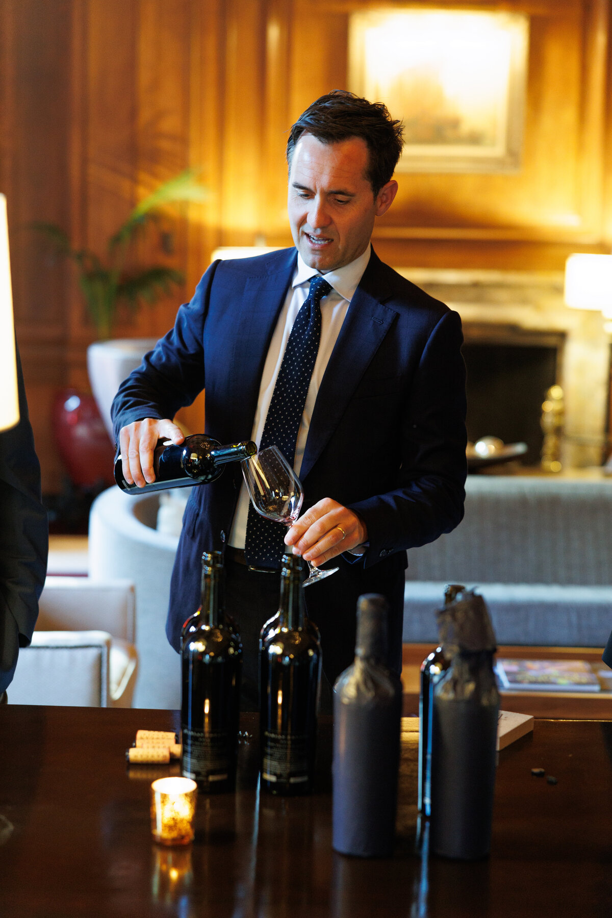 Man pouring red wine