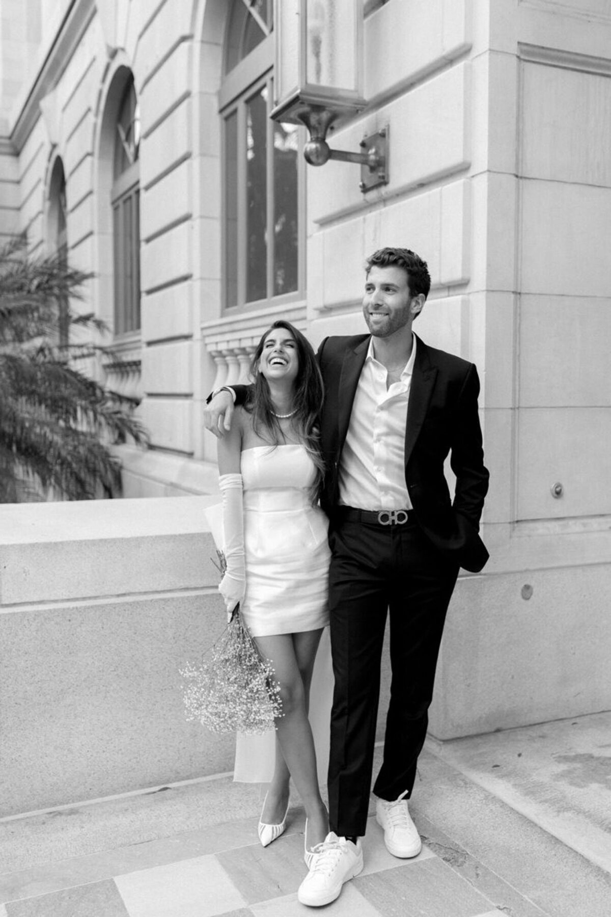 Couple with arms around each other taken by Marissa Nicole, engagement photographer in orlando
