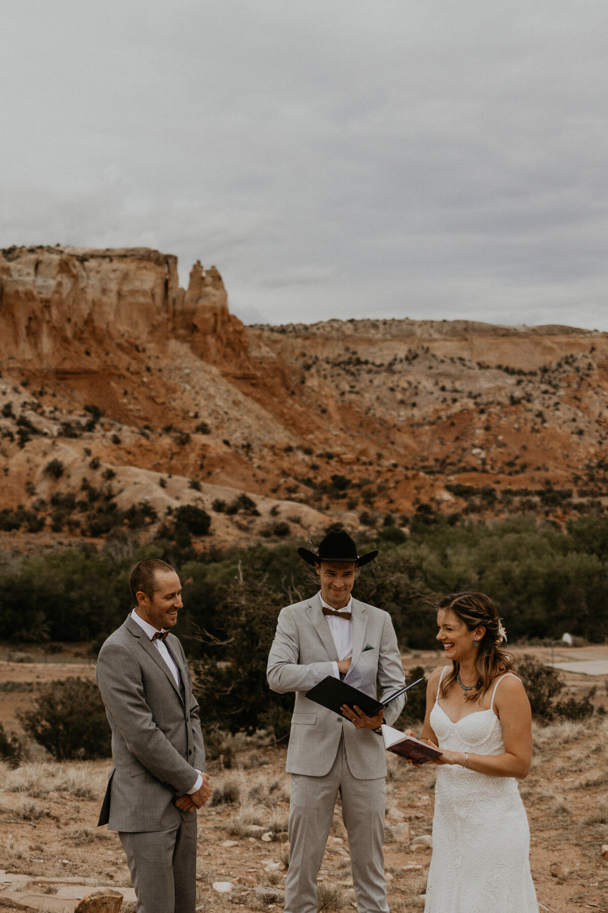 intimate wedding eremony at Ghost Ranch in front of red rocks