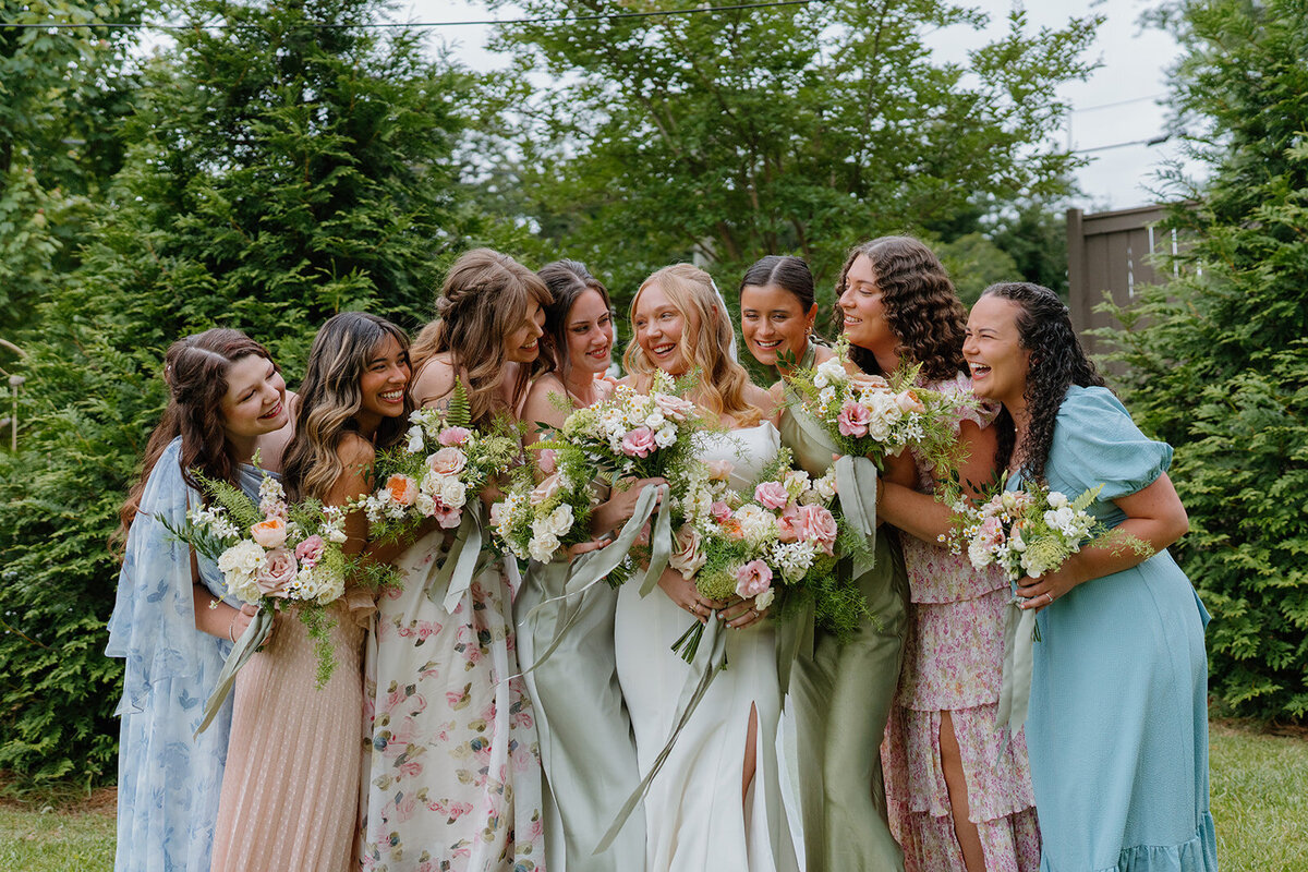 Bride and bridesmaids with bouquets designed by Abby Grace Florals at Easley SC wedding