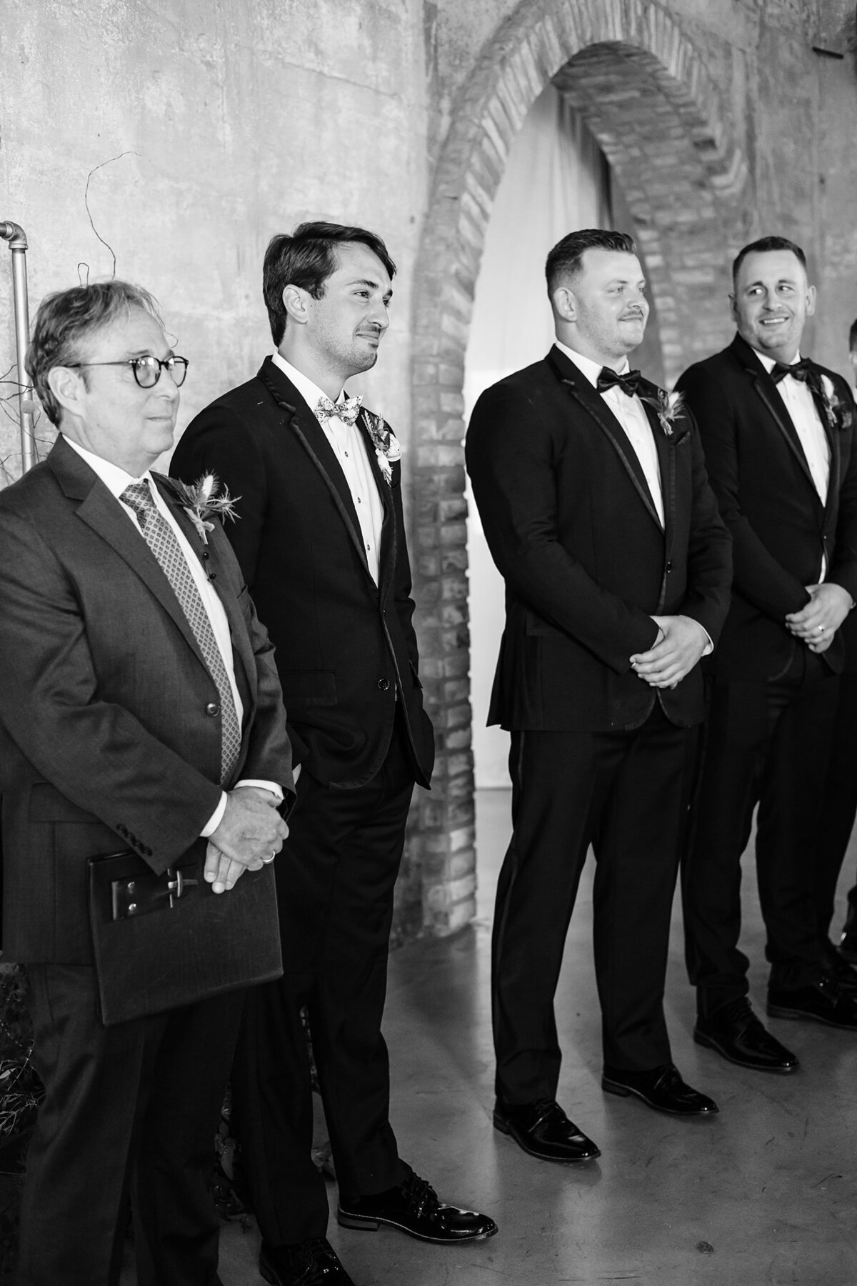 Groom's emotional reaction to bride walking down the aisle at Olde Dobbin Station.