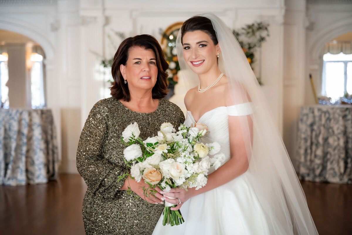 mom and daughter on wedding day at pittsburgh golf club with flower bouquet by the farmers daughter