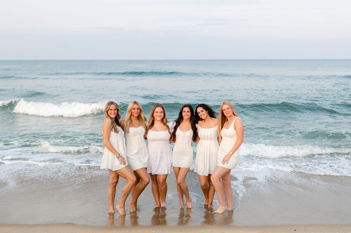 NJ senior photoshoot fun friends shoot cap and gown spring lak sea girt beach shoot white dresses-379