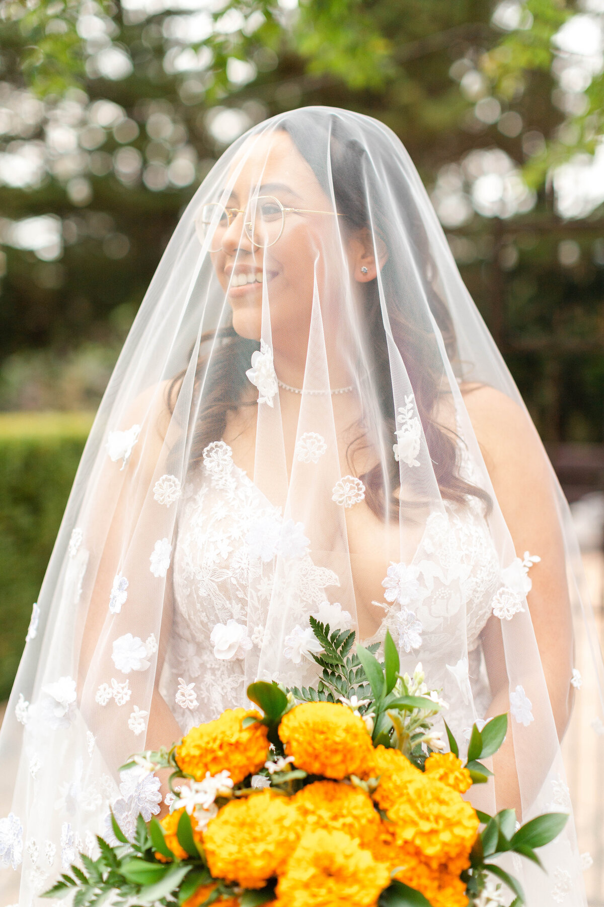 Beautiful bride holding a flower