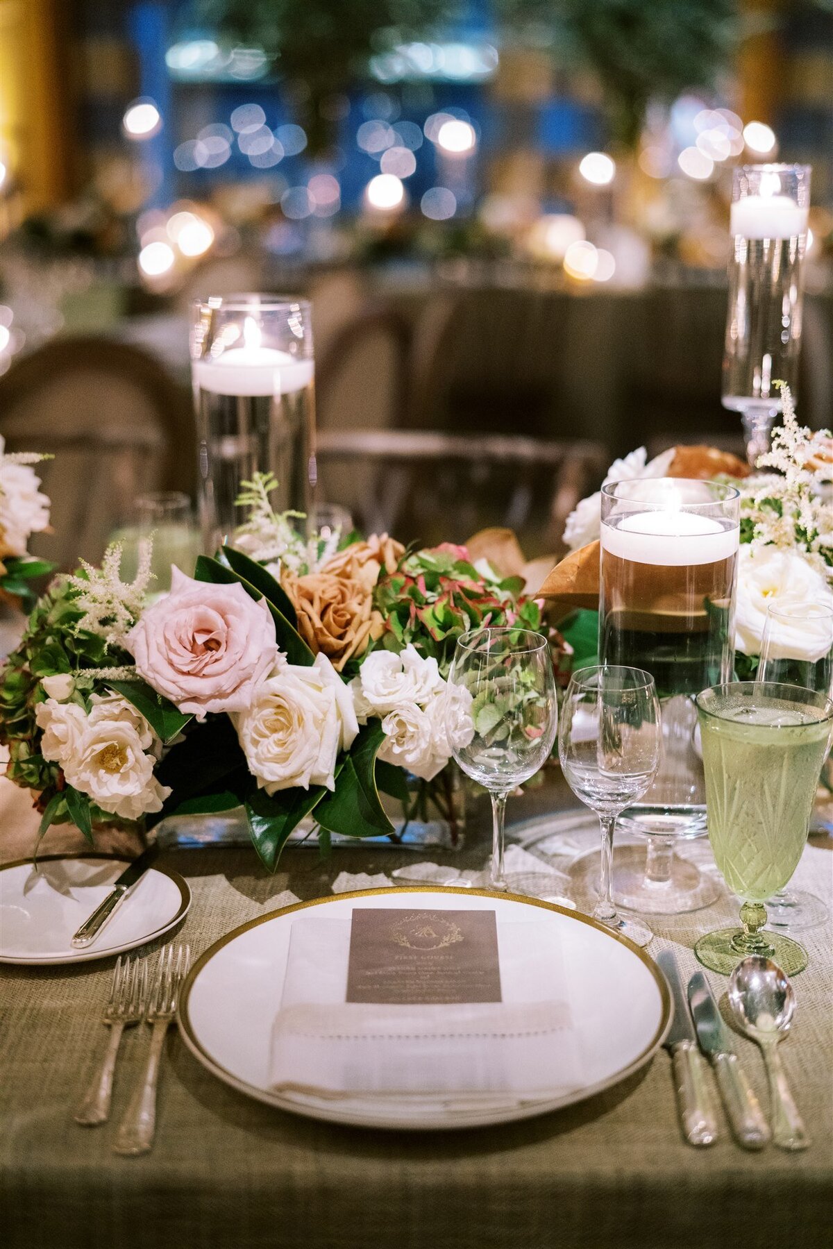 Close up of the place setting for a table at the reception. 