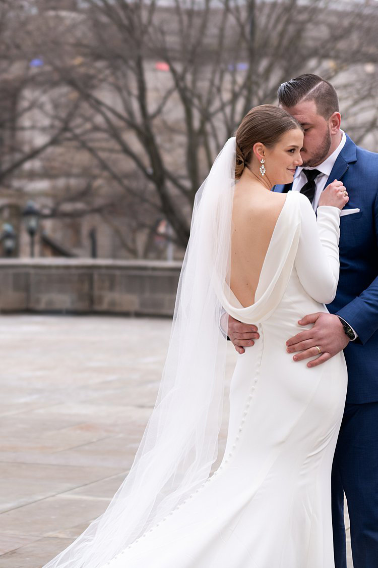 NFL free agent and his wife on their wedding day at Cathedral of Learning in Pittsburgh, PA