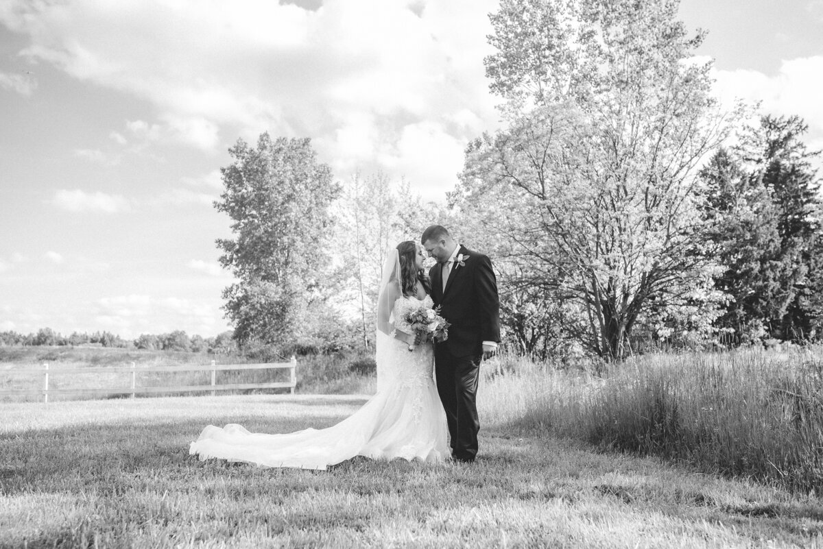 black and white photograph of bride and groom at combia ballroom wedding
