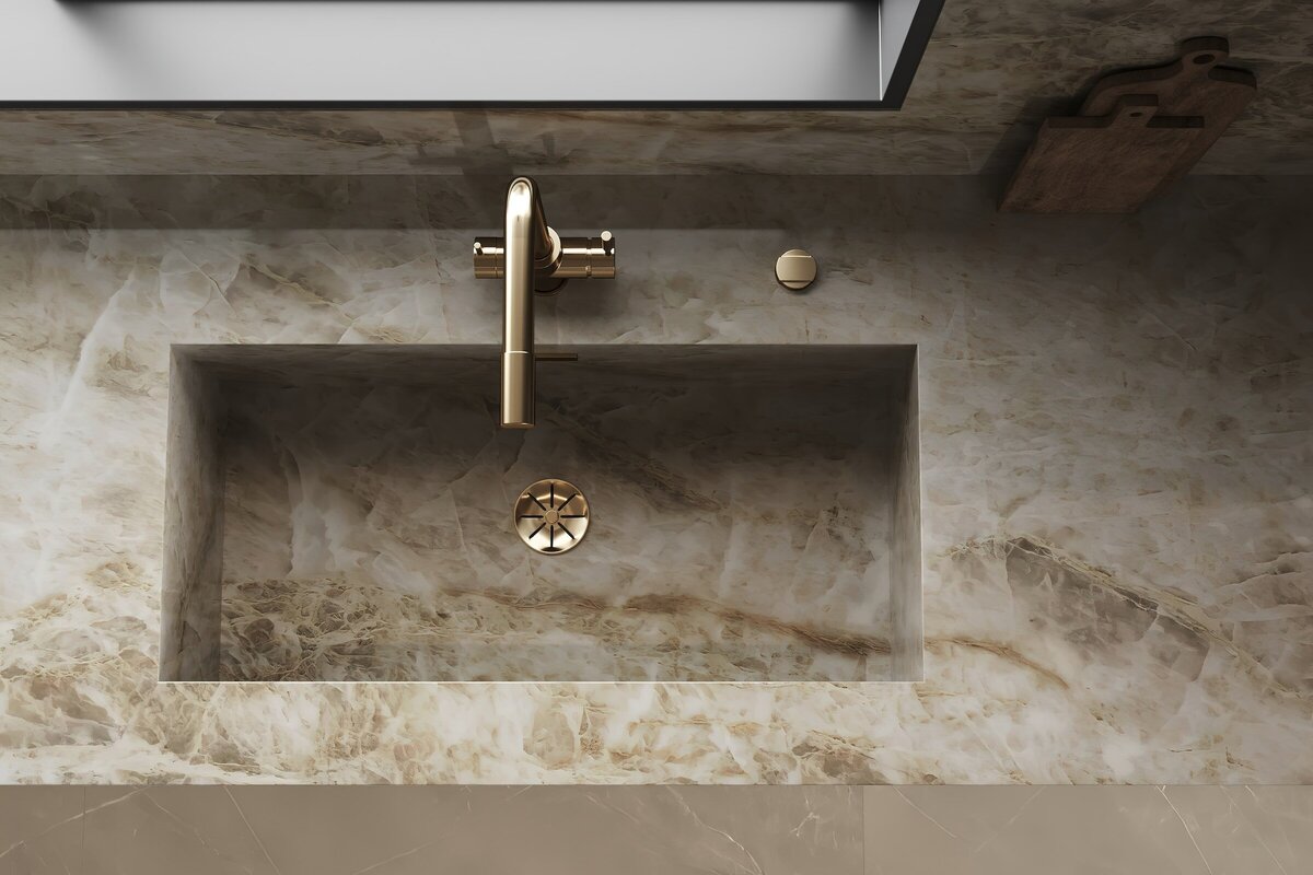 Stone countertop with sink and brass faucet