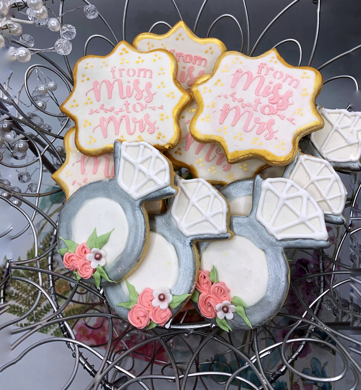 Decorated bridal shower engagement ring and "Miss to Mrs" decorated sugar cookies