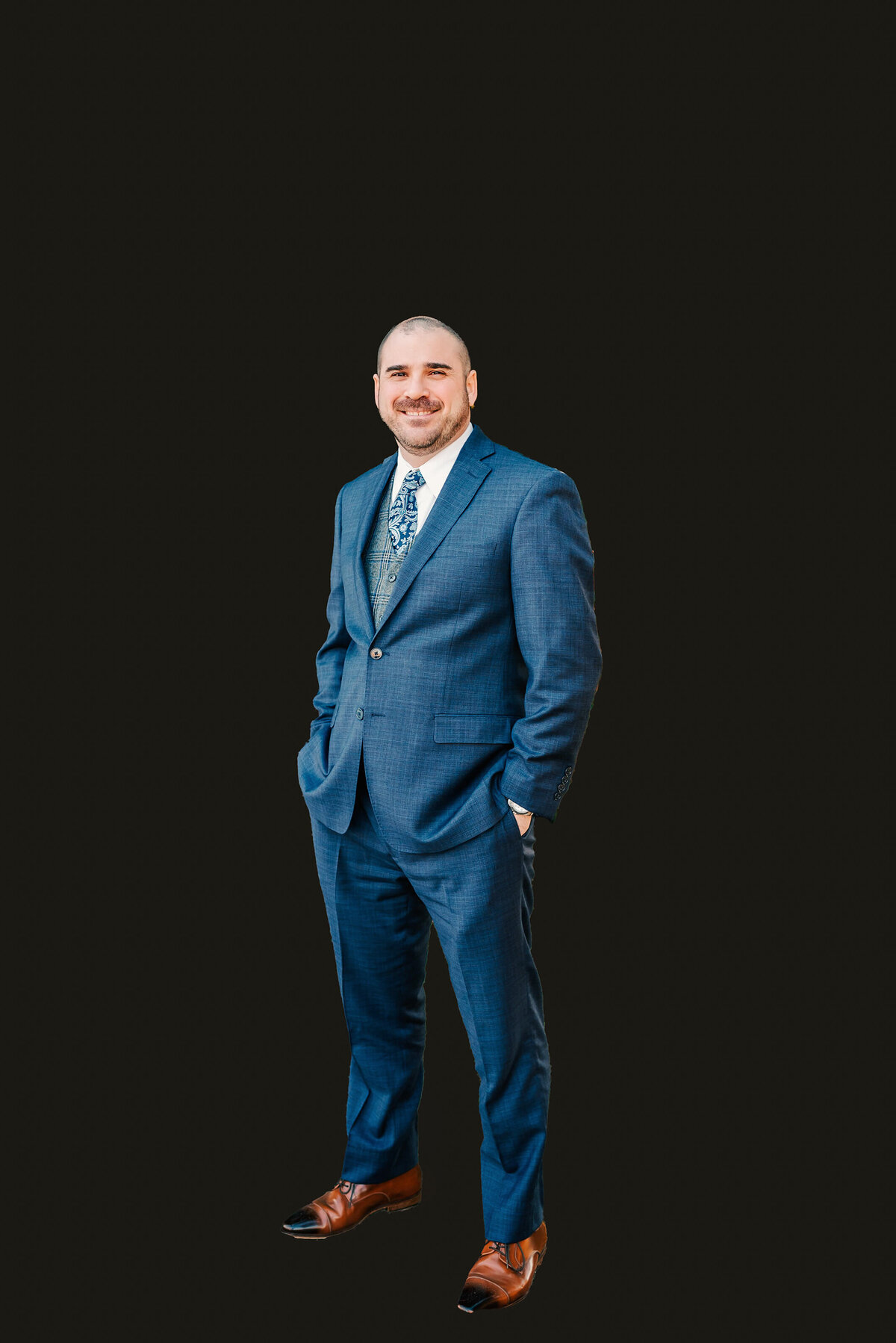 headshot photo of man in blue suit standing during Springfield MO headshot photography session