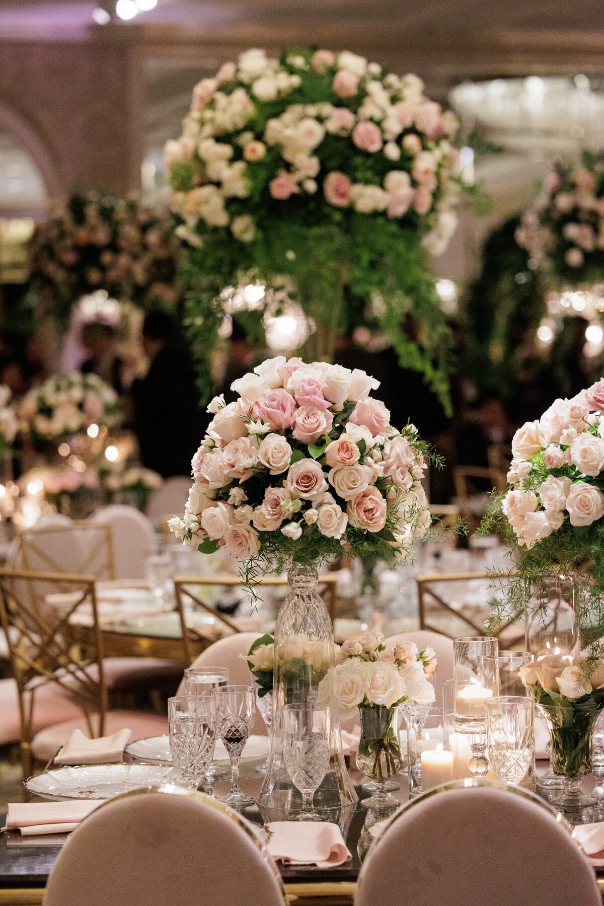 Bouquets of flowers in the center of wedding reception tables