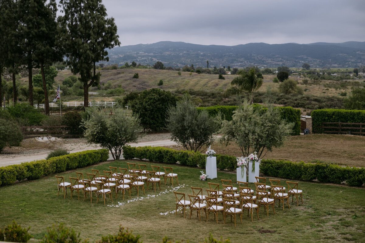 Empty ceremony chairs and decor before the guests arrive.