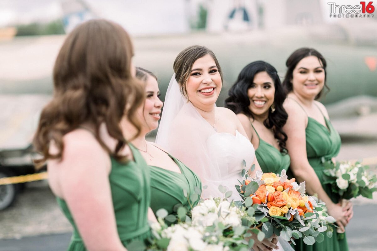 Bride shares a laugh with her Bridesmaids
