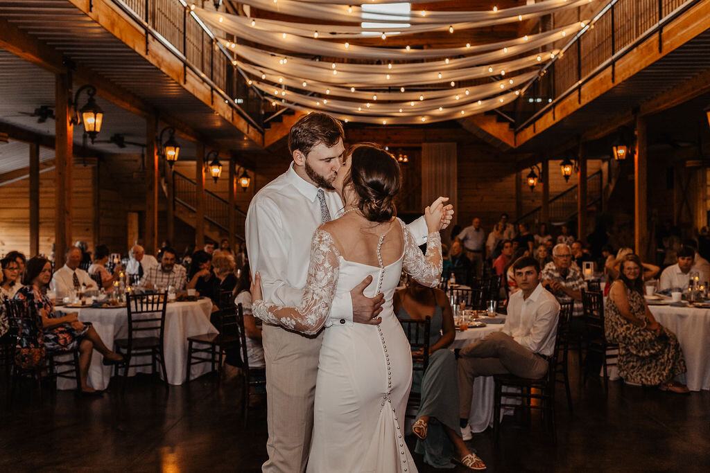 couple dancing at a barn wedding