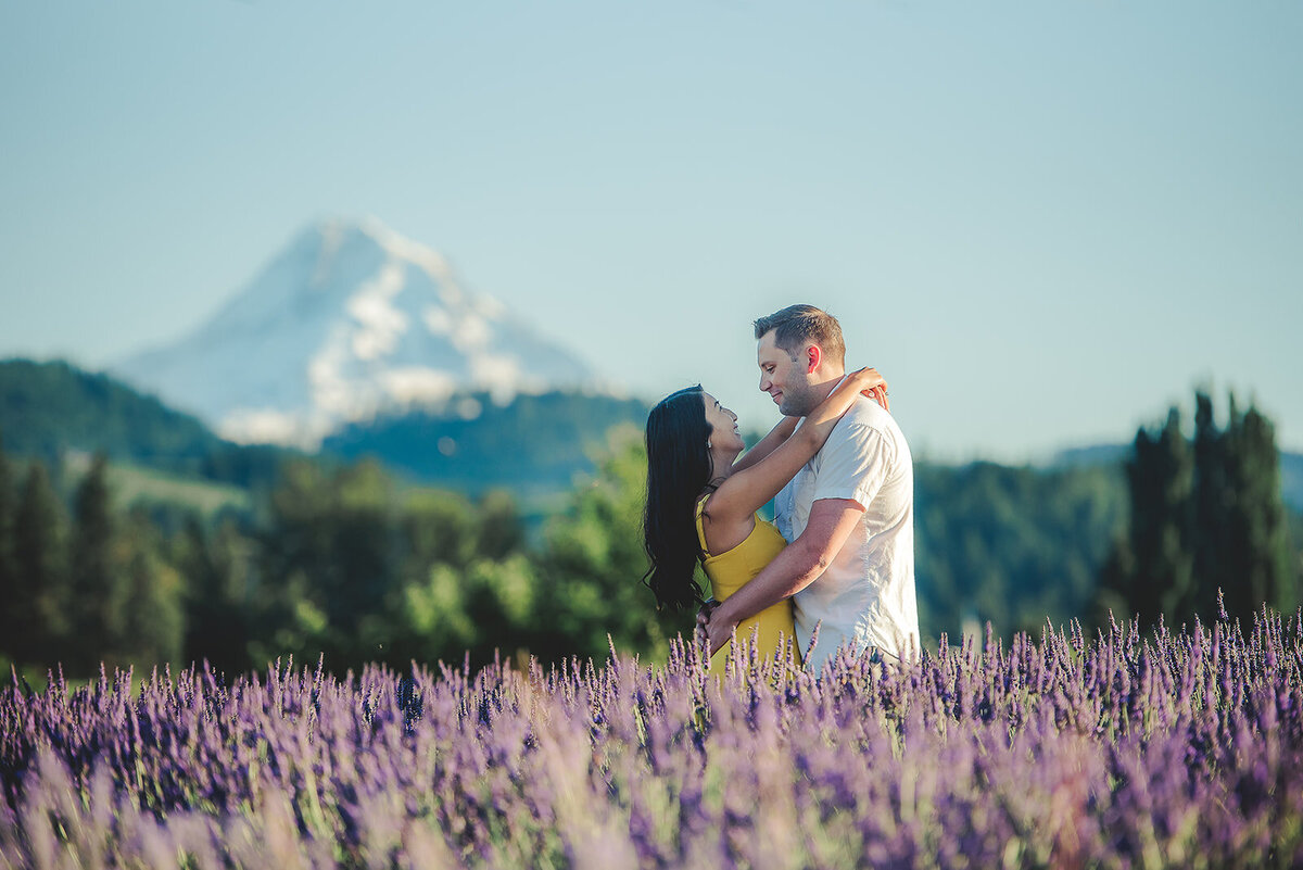 couple hugging by mountain