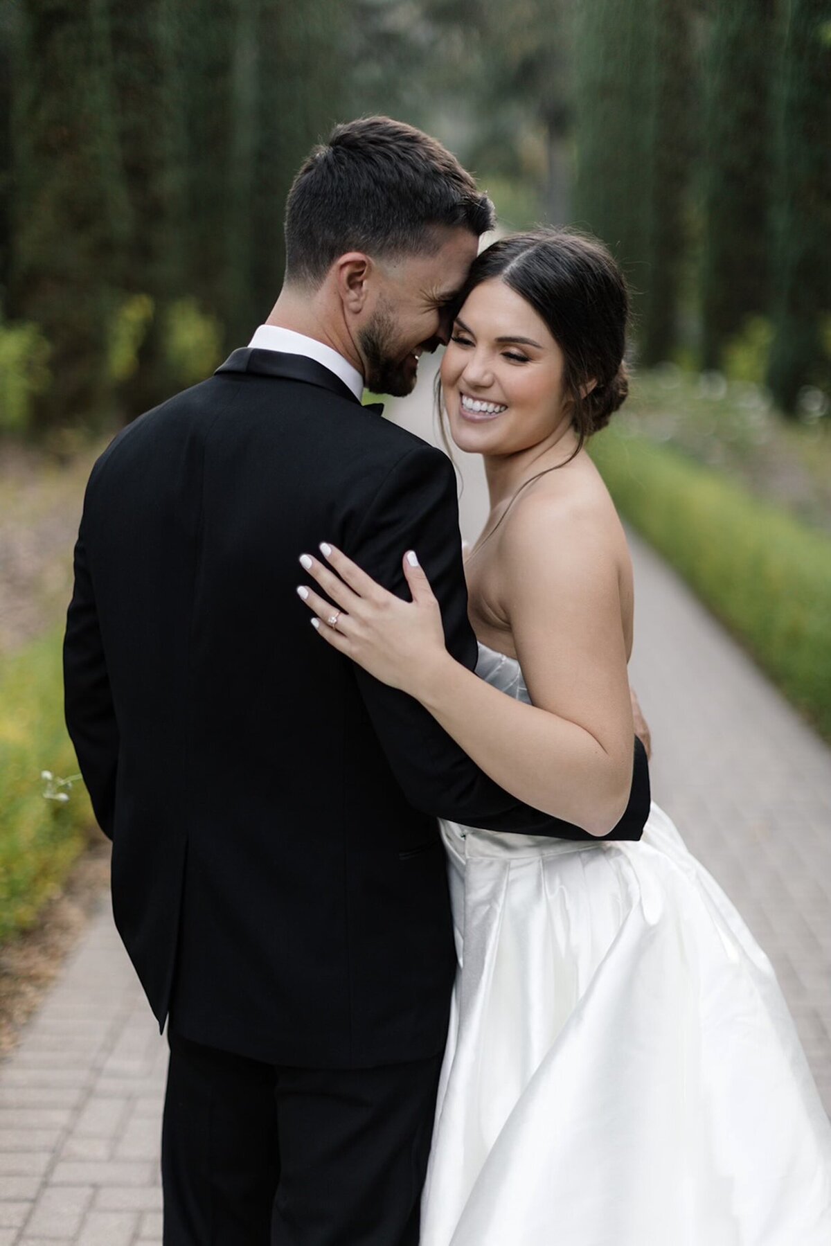 bride and groom embracing at Villa Montalvo