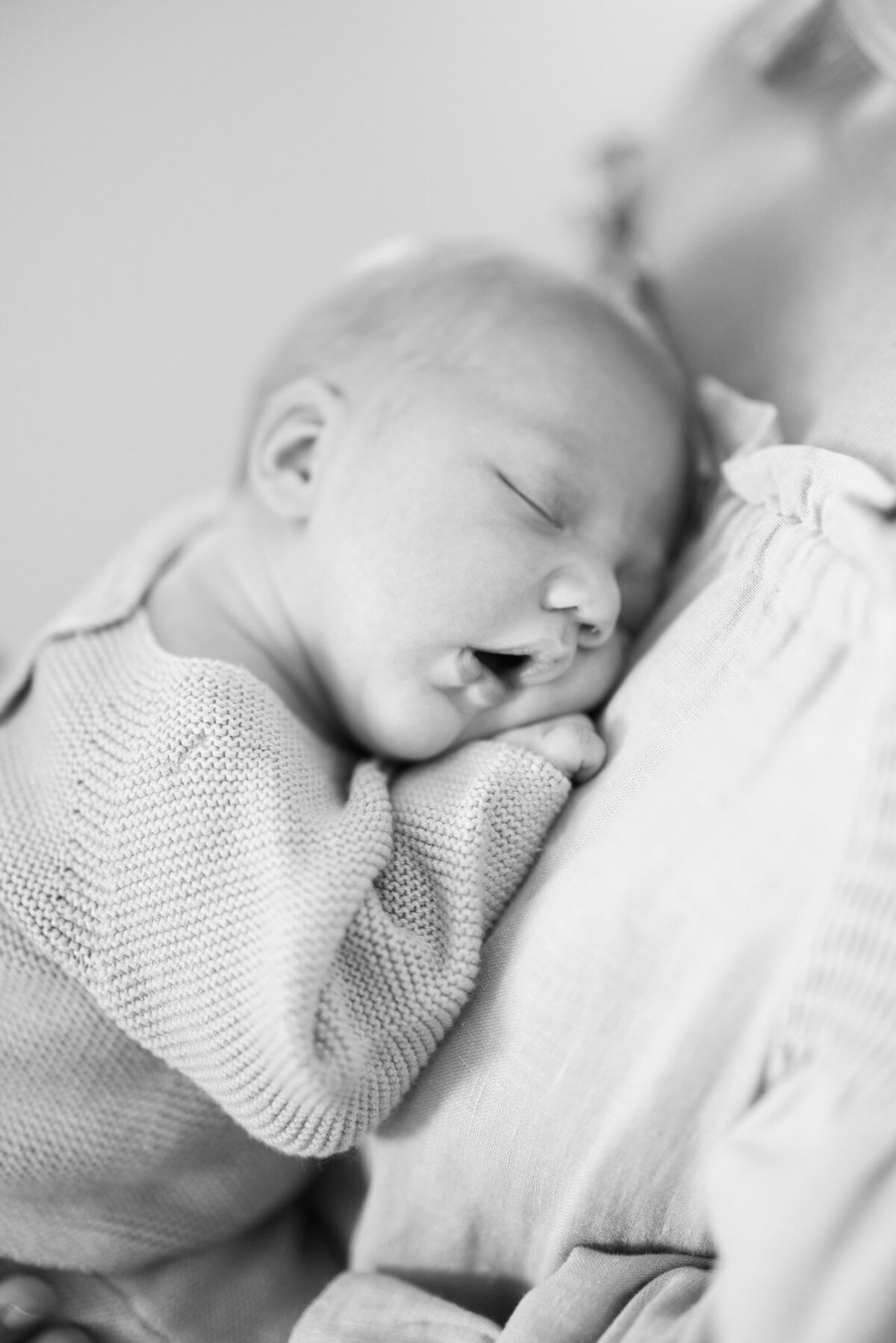baby sleeping with mouth open for Tampa newborn photographer Tina Marie Studio.