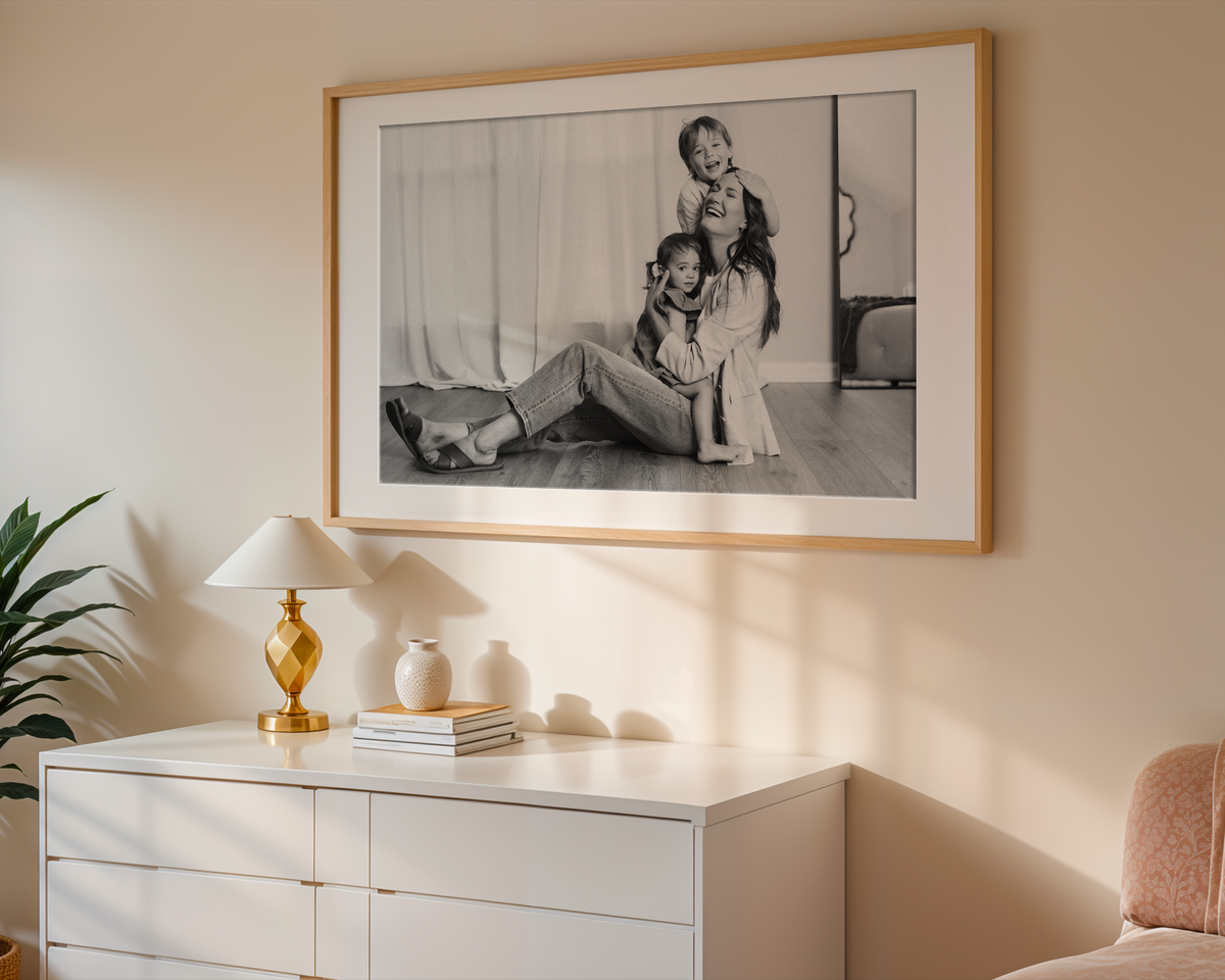 example mockup of a framed enlarged images hanging above a dresser
