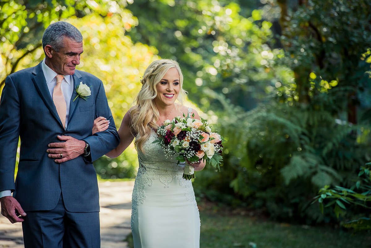 bride and father walking