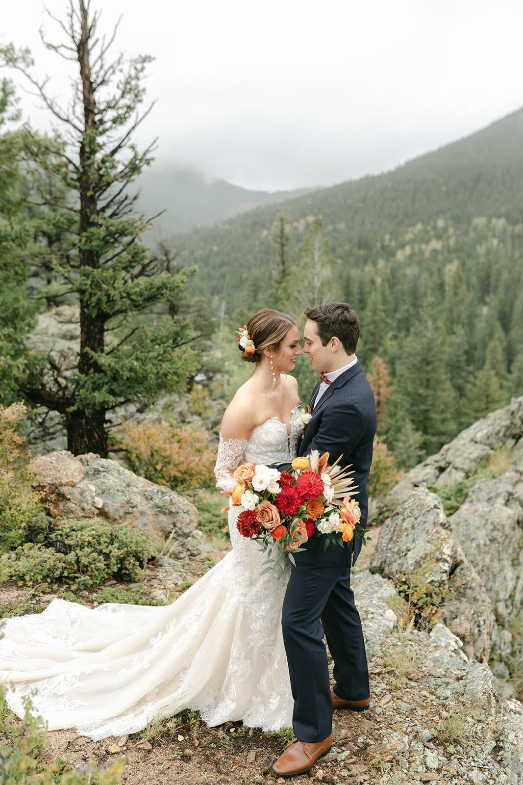 Bride and Groom in the mountains on their wedding day at North Star Gatherings.