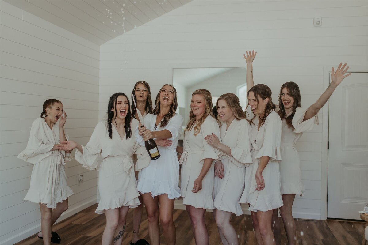 popping-champagne-bridesmaids-getting-ready