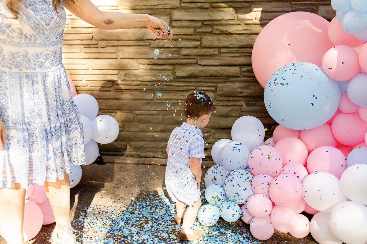 gender reveal balloon pop confetti and balloon arch